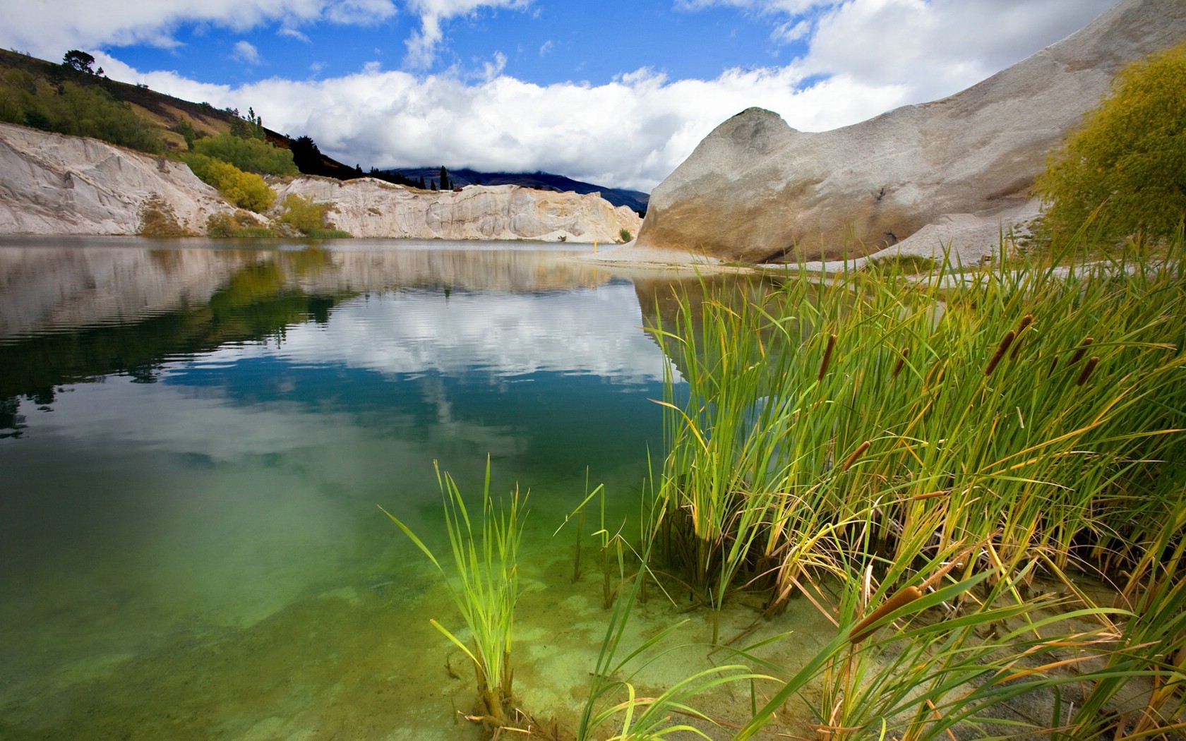 壁纸1680x1050 新西兰 山峰上的湖泊 新西兰皇后镇 Queenstown New Zealand壁纸 新西兰的山水如画壁纸壁纸 新西兰的山水如画壁纸图片 新西兰的山水如画壁纸素材 风景壁纸 风景图库 风景图片素材桌面壁纸