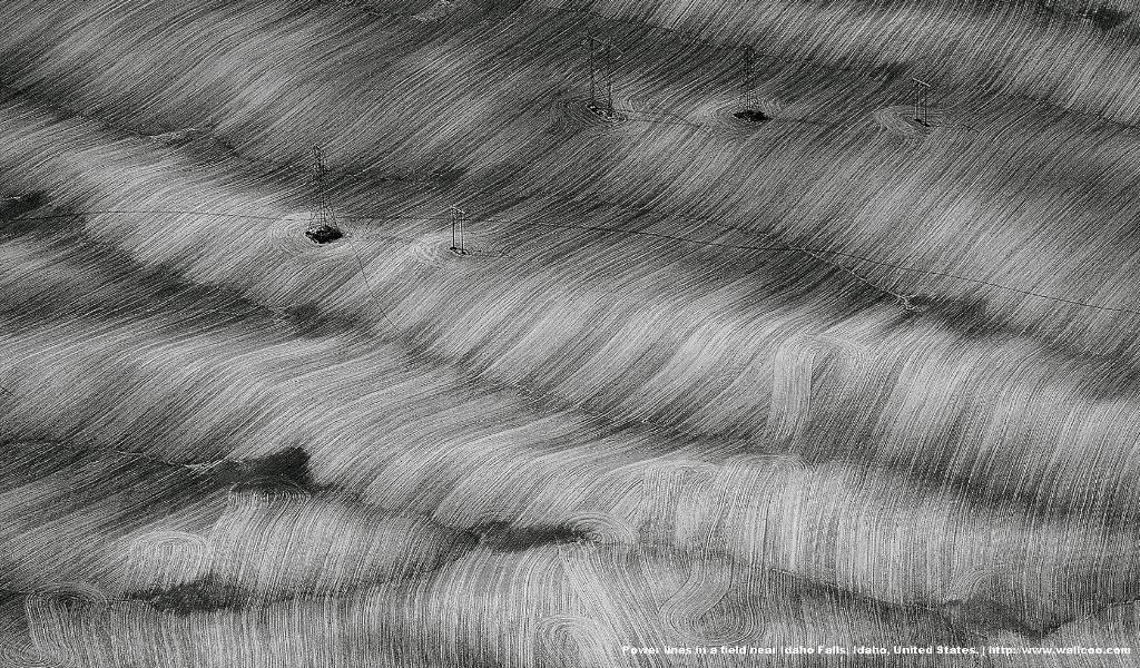 壁纸1024x600上帝之眼 Yann Arthus Bertrand 扬恩 亚瑟空中摄影奇景壁纸北美篇 鸟瞰美国 爱达荷瀑布市附近的电力线图片壁纸壁纸 扬恩·亚瑟空中摄影奇景 北美篇壁纸 扬恩·亚瑟空中摄影奇景 北美篇图片 扬恩·亚瑟空中摄影奇景 北美篇素材 风景壁纸 风景图库 风景图片素材桌面壁纸